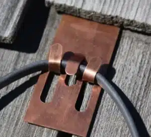 A stamped copper clip
